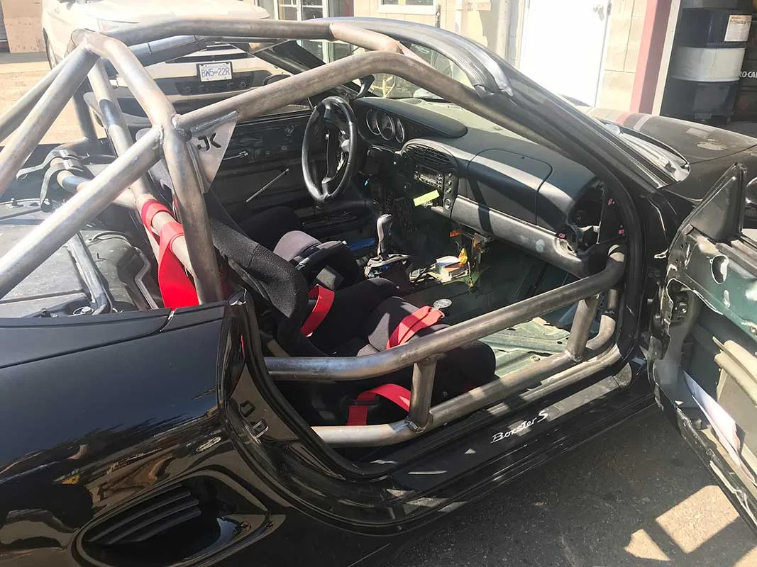 Porsche Boxer roll cage fitted for track duty