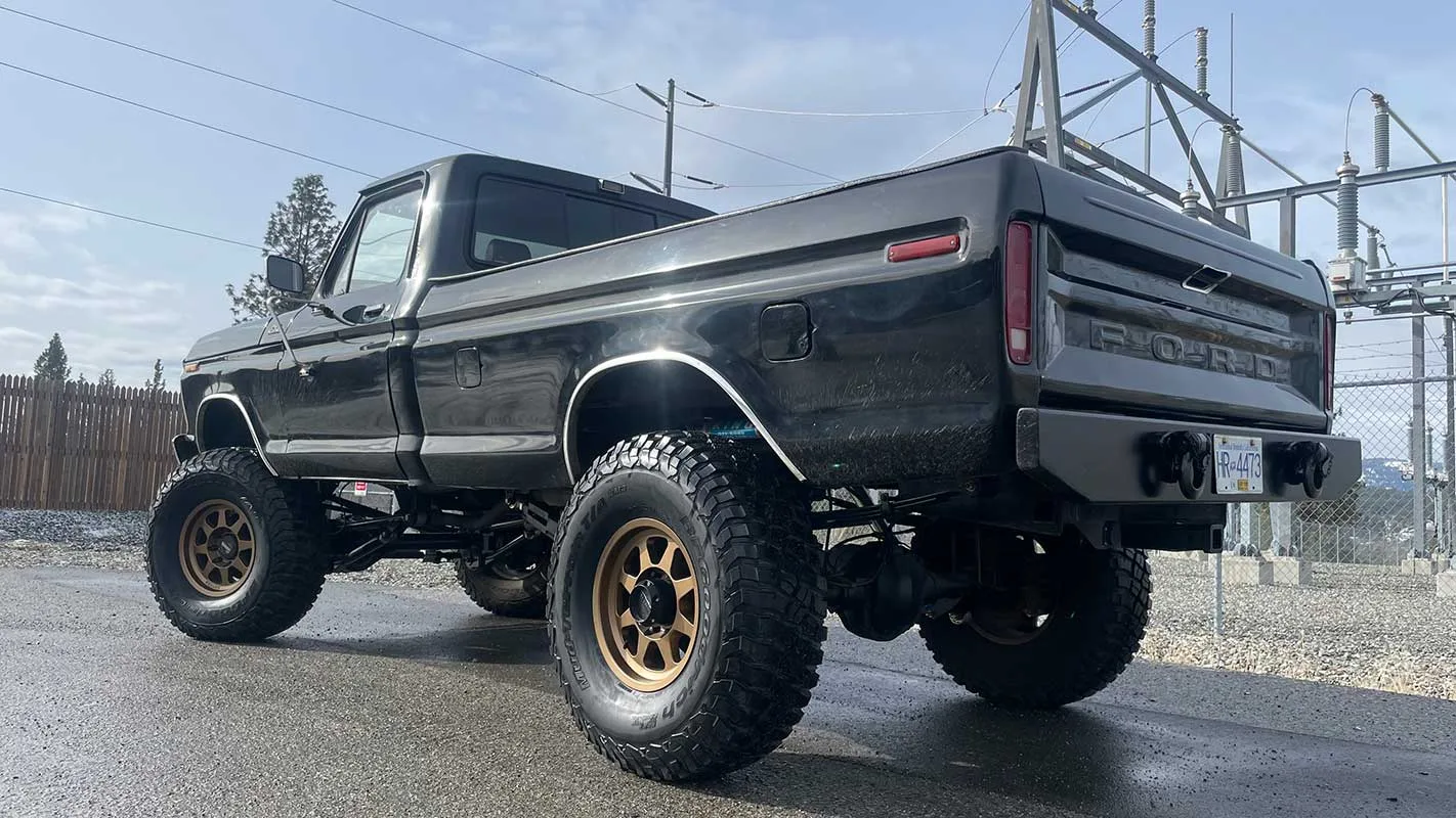1978 Ford F150 with axle swap, custom 4-link suspension, and coilovers on 39-inch KM3 tires
