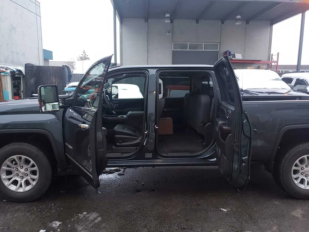 Mobility truck, suicide doors open showing the custom fabrication detail